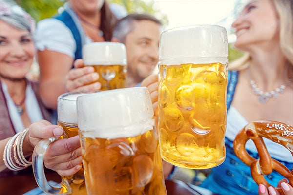 Oktoberfest group with pretzels and beer