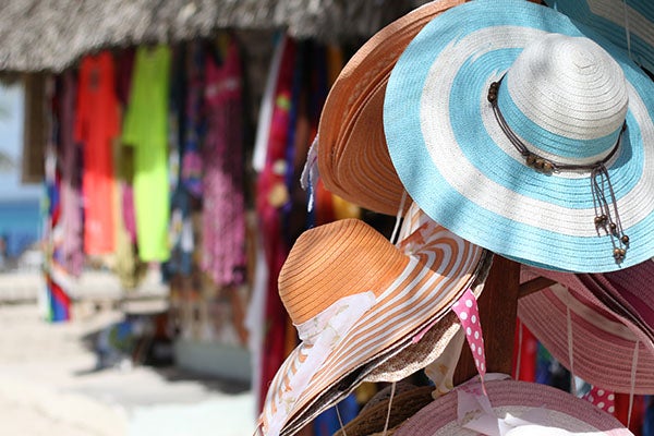 Beachy sun hats at a sho by the beach