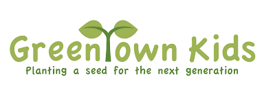 Green town kids planting a seed for the next generation